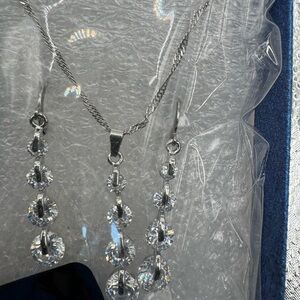 Cascading round cut earrings necklace set clear stones